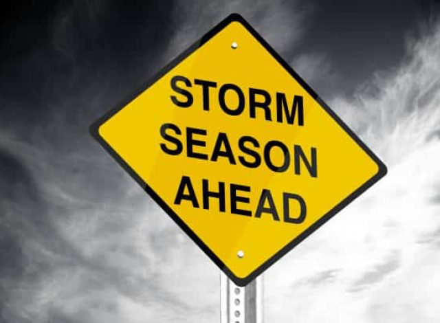 Storm season ahead road sign.